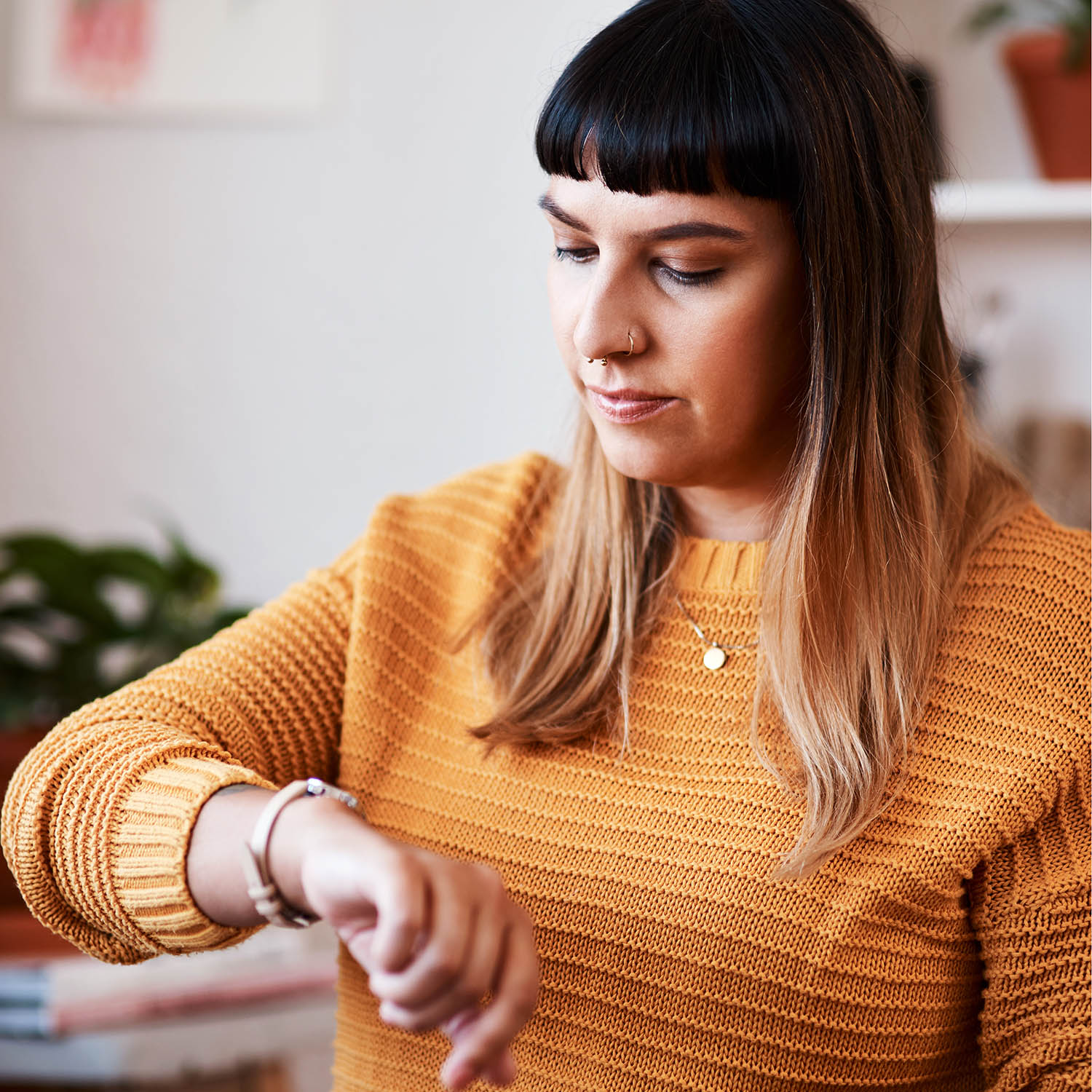 Woman looking at watch