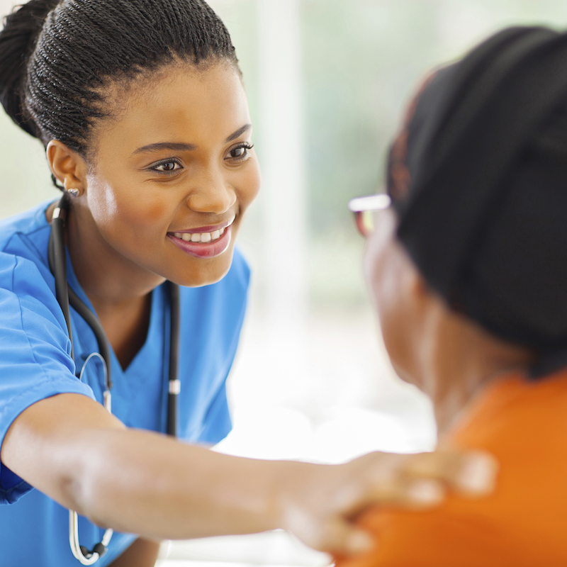 Doctor talks with Cancer Patient