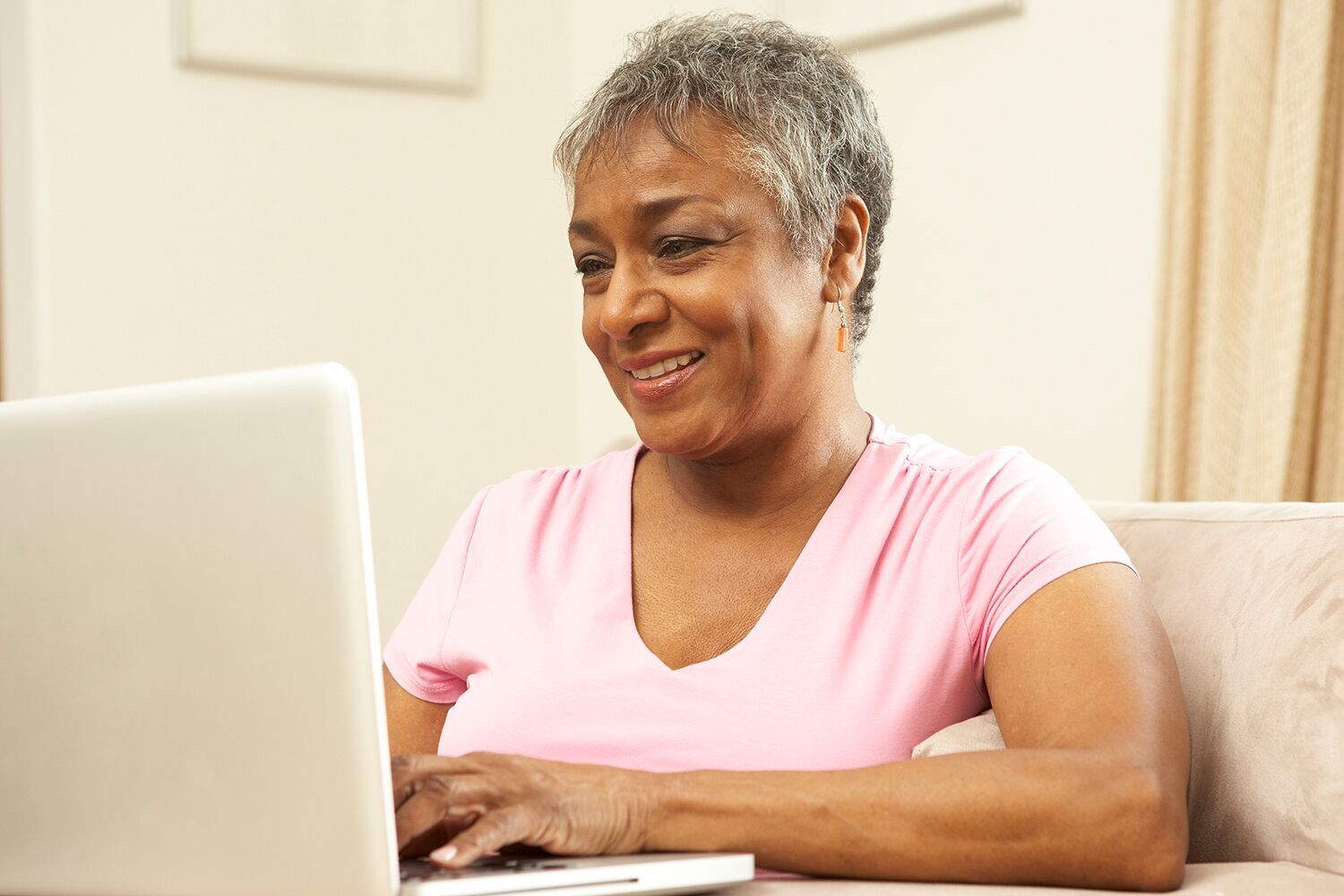 Woman looking up medical information on her computer
