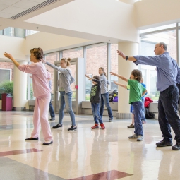 Adults and children learn Tai Chi