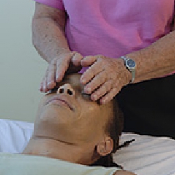 Woman performing Reiki.