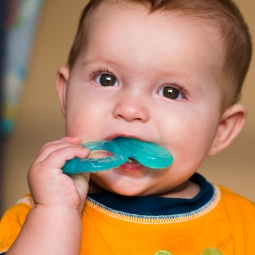 baby with teething ring