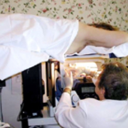 Janet Baum M.D., Director, performing a core needle biopsy.