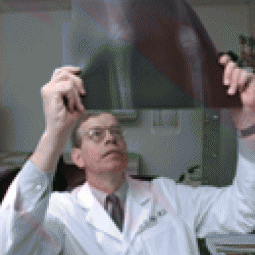 Daniel O. Clegg, M.D., reading an X-Ray