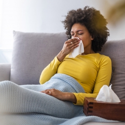 woman with a box of tissues