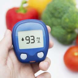 man testing blood sugar