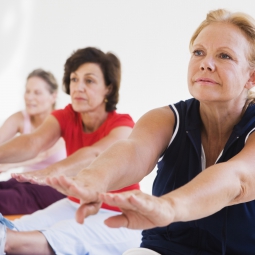 Senior women stretching during an exercise class