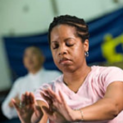 Woman in a Tai Chi pose.