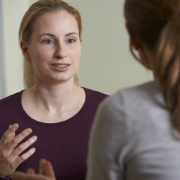 woman talking to therapist