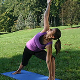 A woman practices yoga.
