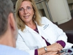 An NCCAM research nurse practitioner talking to a patient about CAM use.